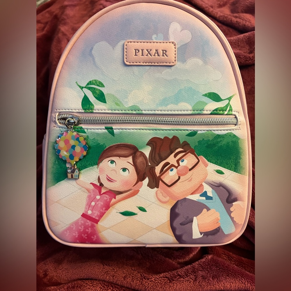 Pixar’s “UP” mini backpack. NWTG